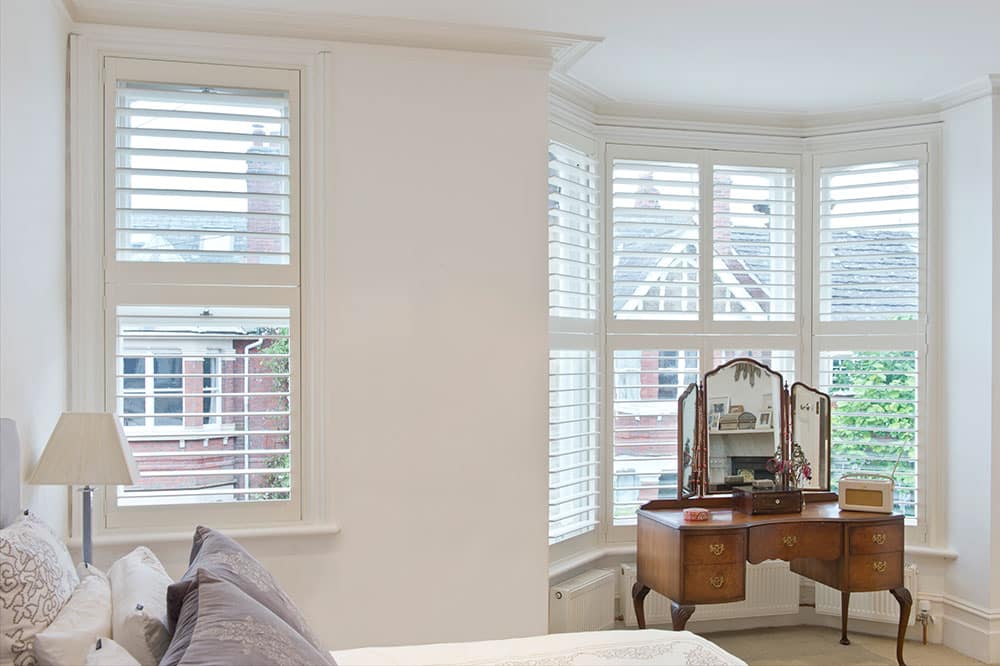 Shutters to Dress a Bay Window Sill